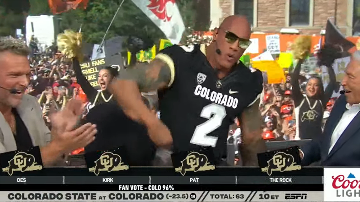 Deion Sanders shades Jay Norvell, hangs with The Rock pregame